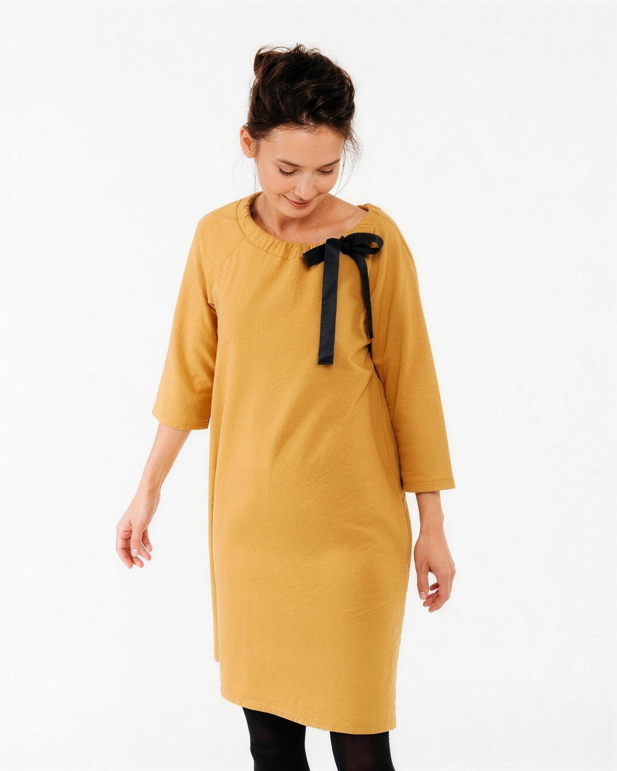 FRENCH – Italian Punto Milano Ribbon Neck A-Line Dress – yellow dress, front view in motion showing the A-line drape and black satin ribbon bow #Color_Yellow