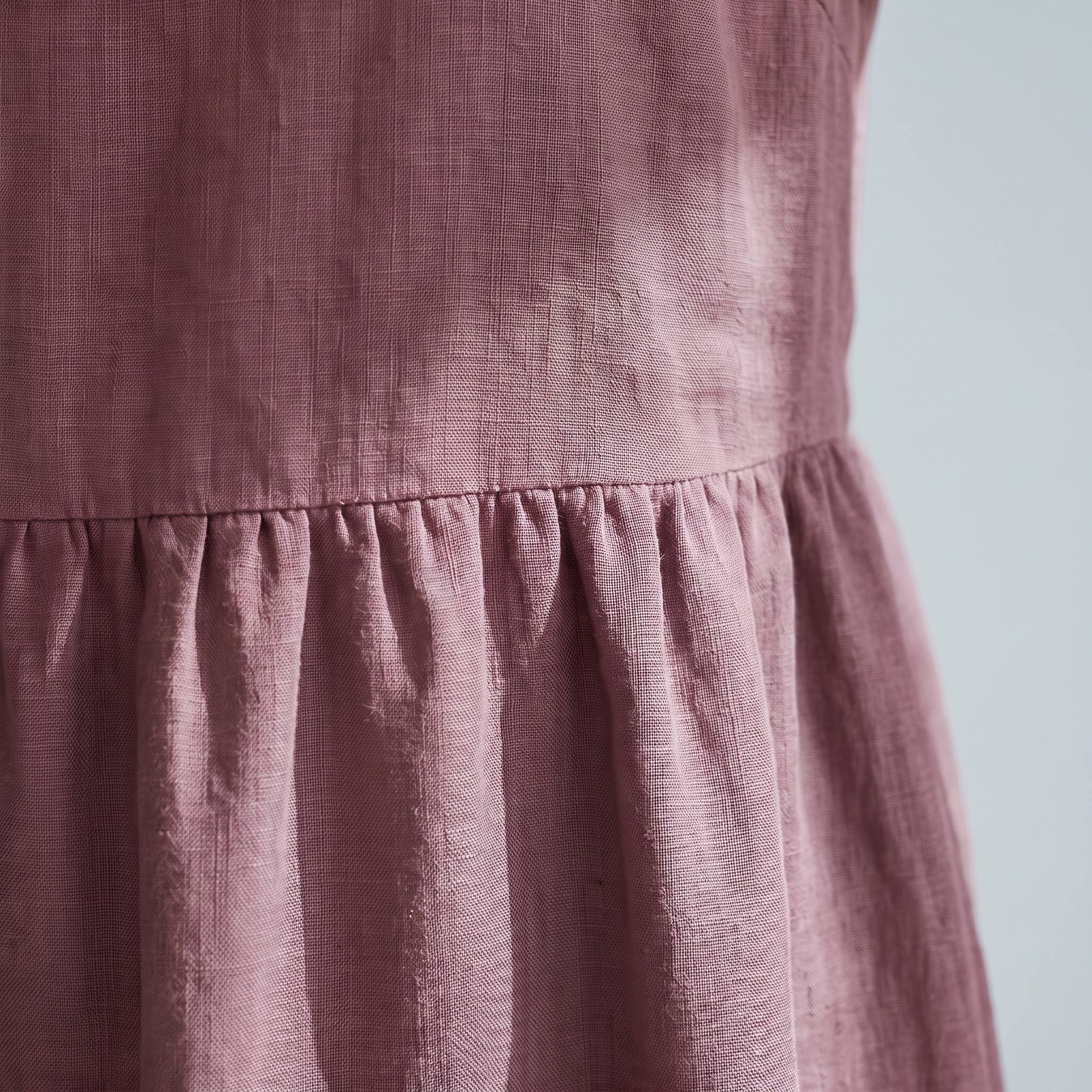 A dusty rose linen dress.