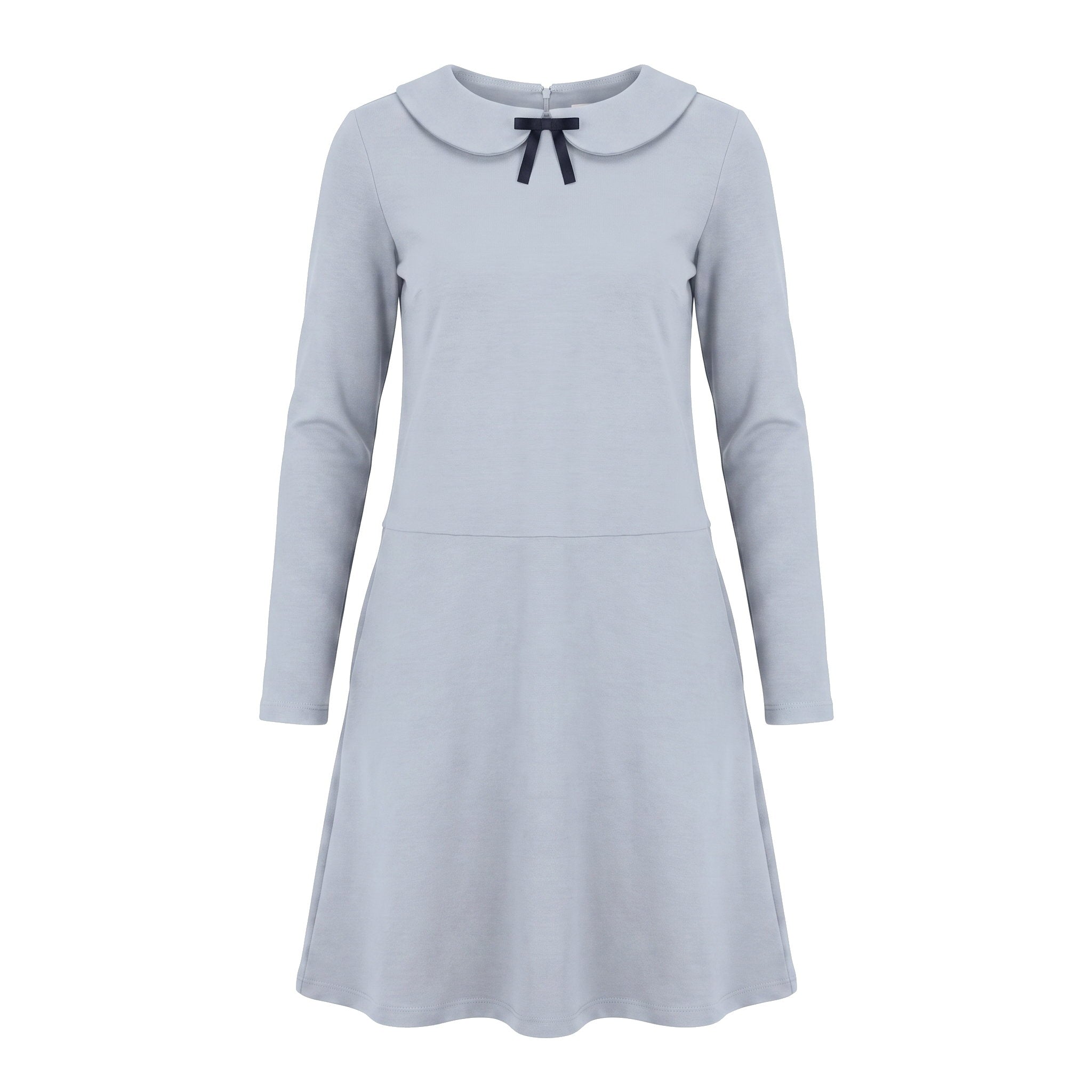 A long-sleeve A-line dress in a light blue color with a small dark navy bow at the neckline, shown against a plain white background.