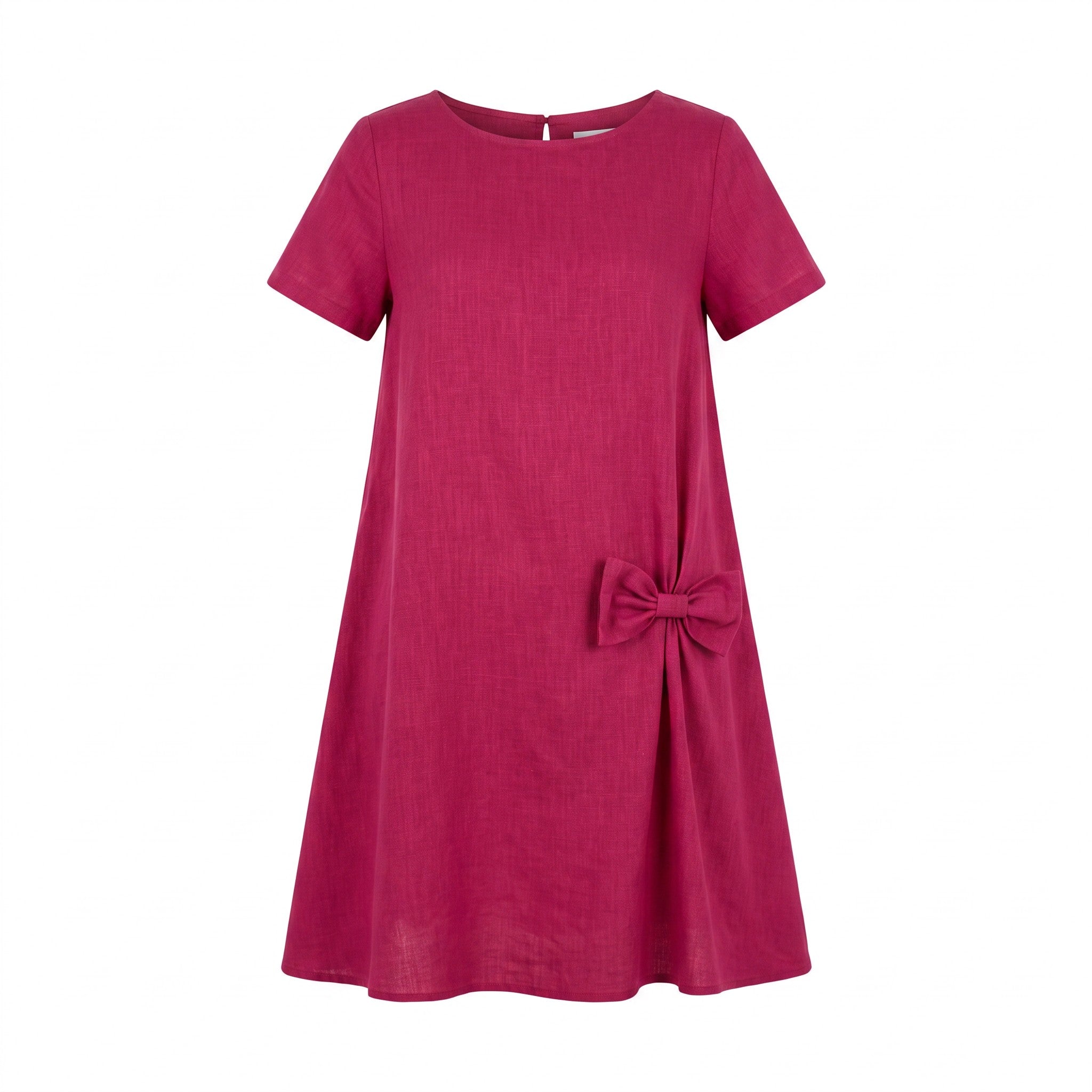 A short-sleeve A-line dress in a rich magenta pink fabric, featuring a matching fabric bow detail on the lower right side, displayed against a solid white background.