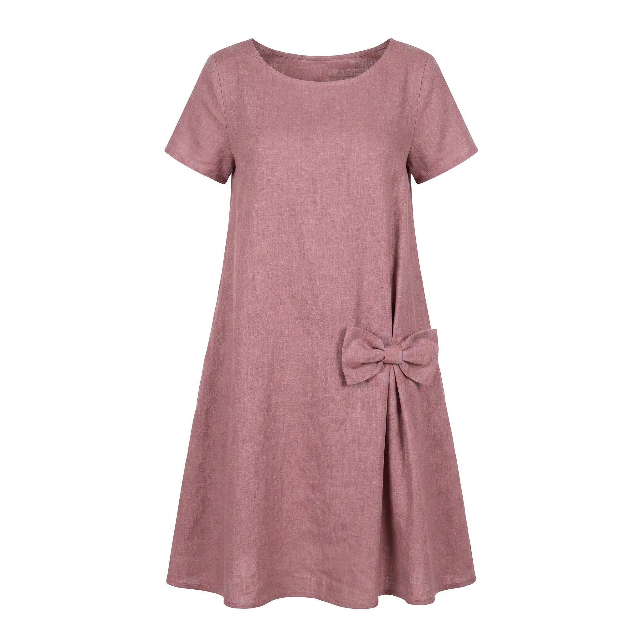 A dusty rose pink short-sleeve linen dress with a round neckline and a matching fabric bow detail on the lower right front, shown against a plain white background.