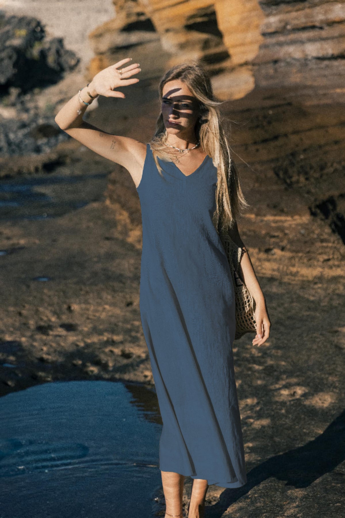 LeMuse SUNSET linen dress in blue – model front full length by the cliffs #Color_Blue