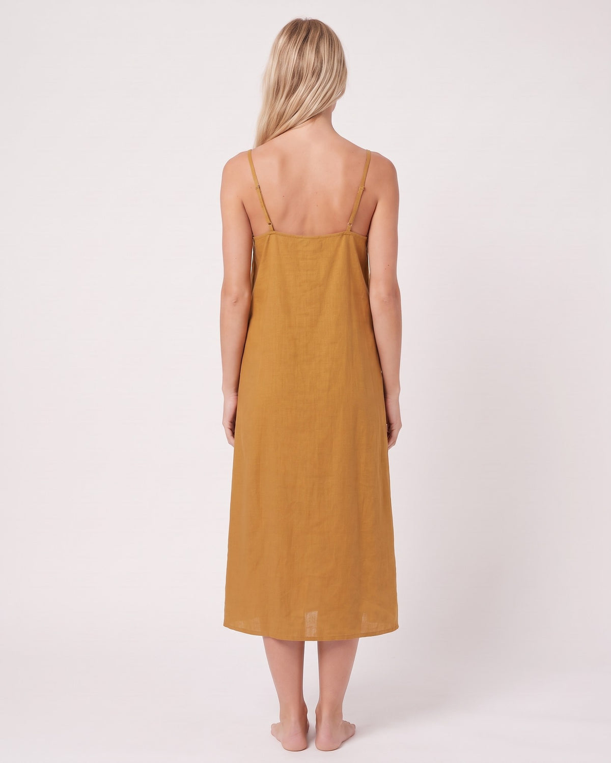 LeMuse SUNSET linen dress in ochre – model back view studio #Color_Ochre
