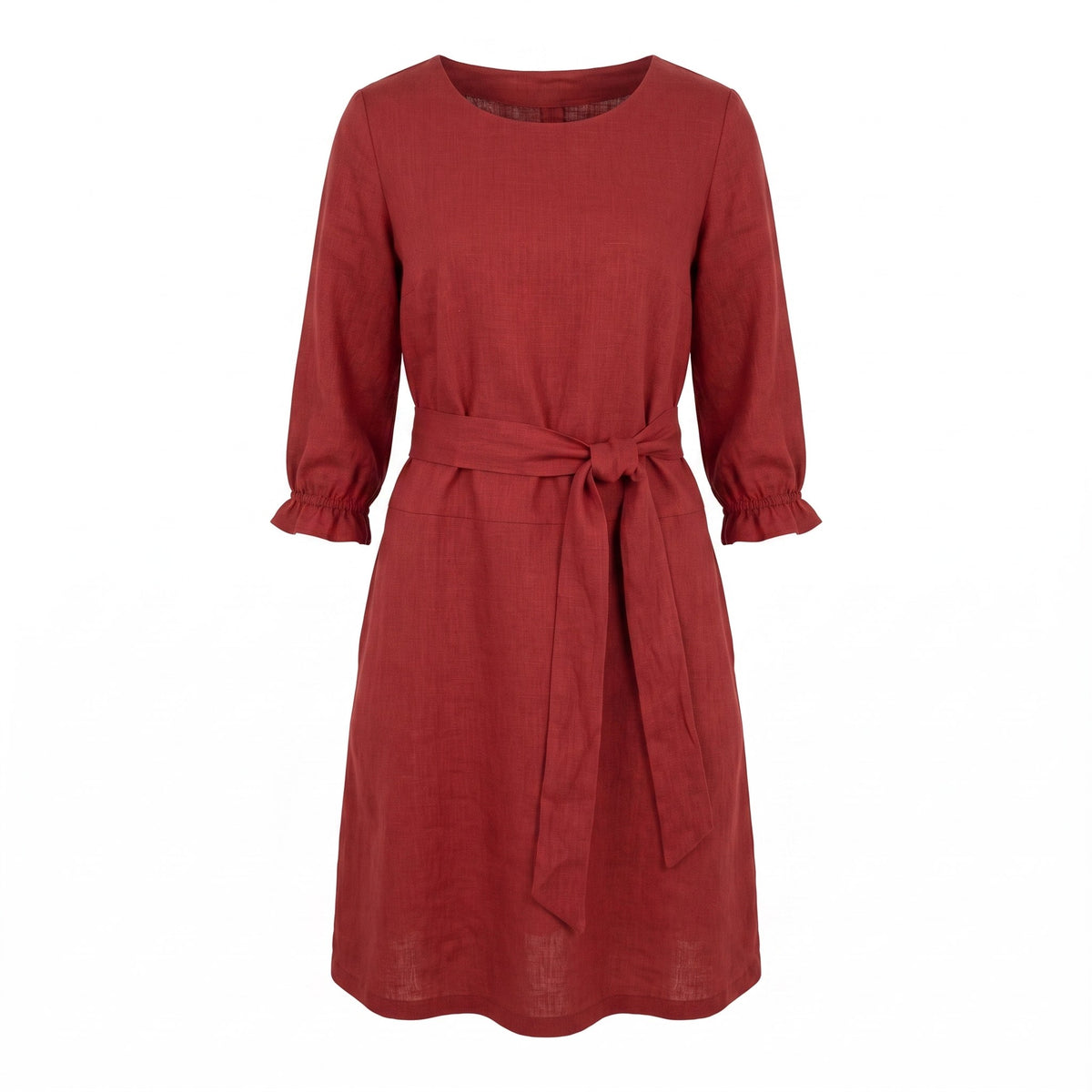 A rust red linen dress with three-quarter sleeves, ruffled cuffs, and a matching fabric tie belt at the waist, shown against a plain white background.