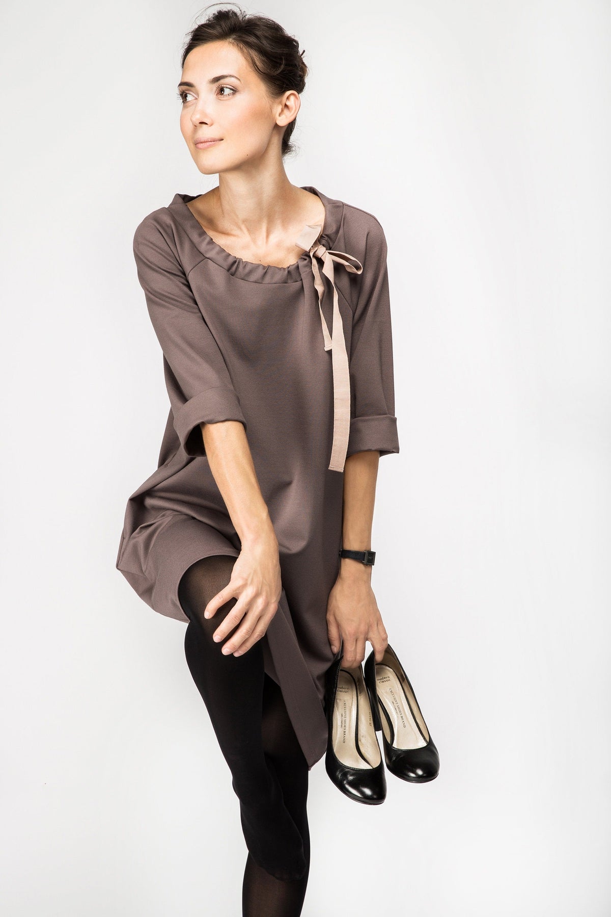 FRENCH – Italian Punto Milano Ribbon Neck A-Line Dress – cacao dress, seated side view with the beige ribbon bow #Color_Cacao