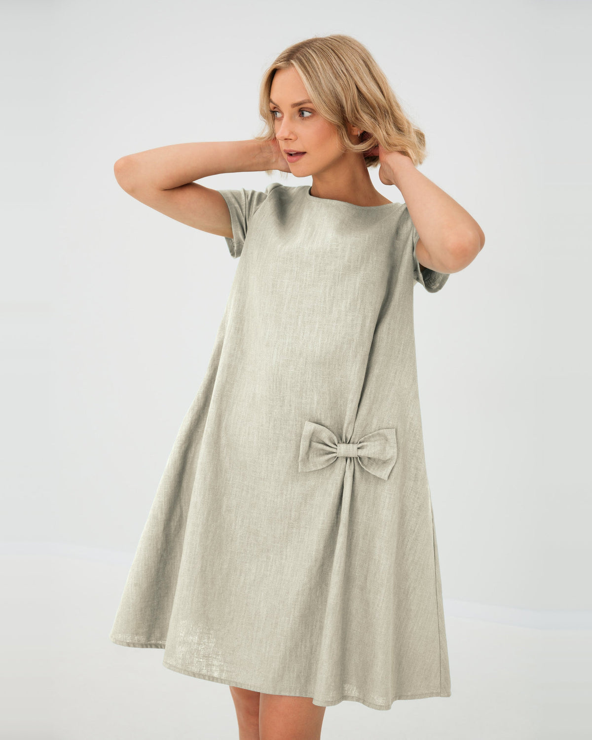 LeMuse SUMMER KISS linen dress in beige – studio front view, hands in hair #Color_Beige