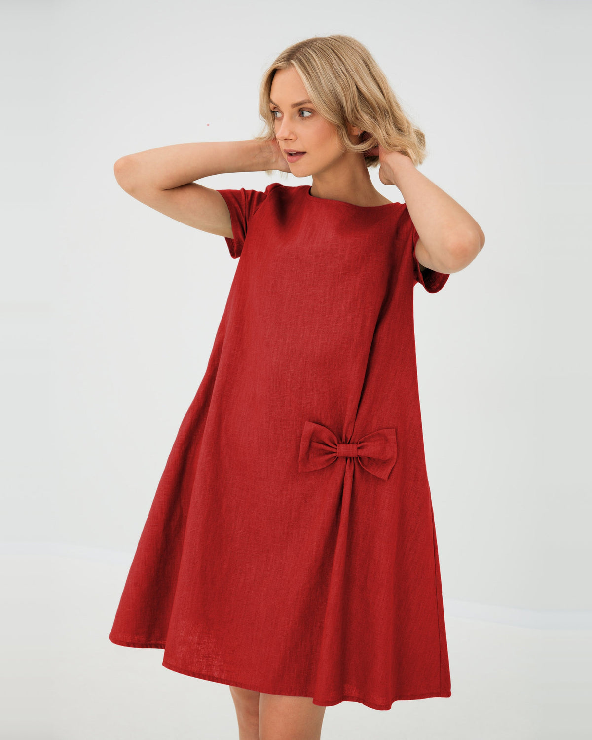 LeMuse SUMMER KISS linen dress in red – studio front view, hands in hair #Color_Red