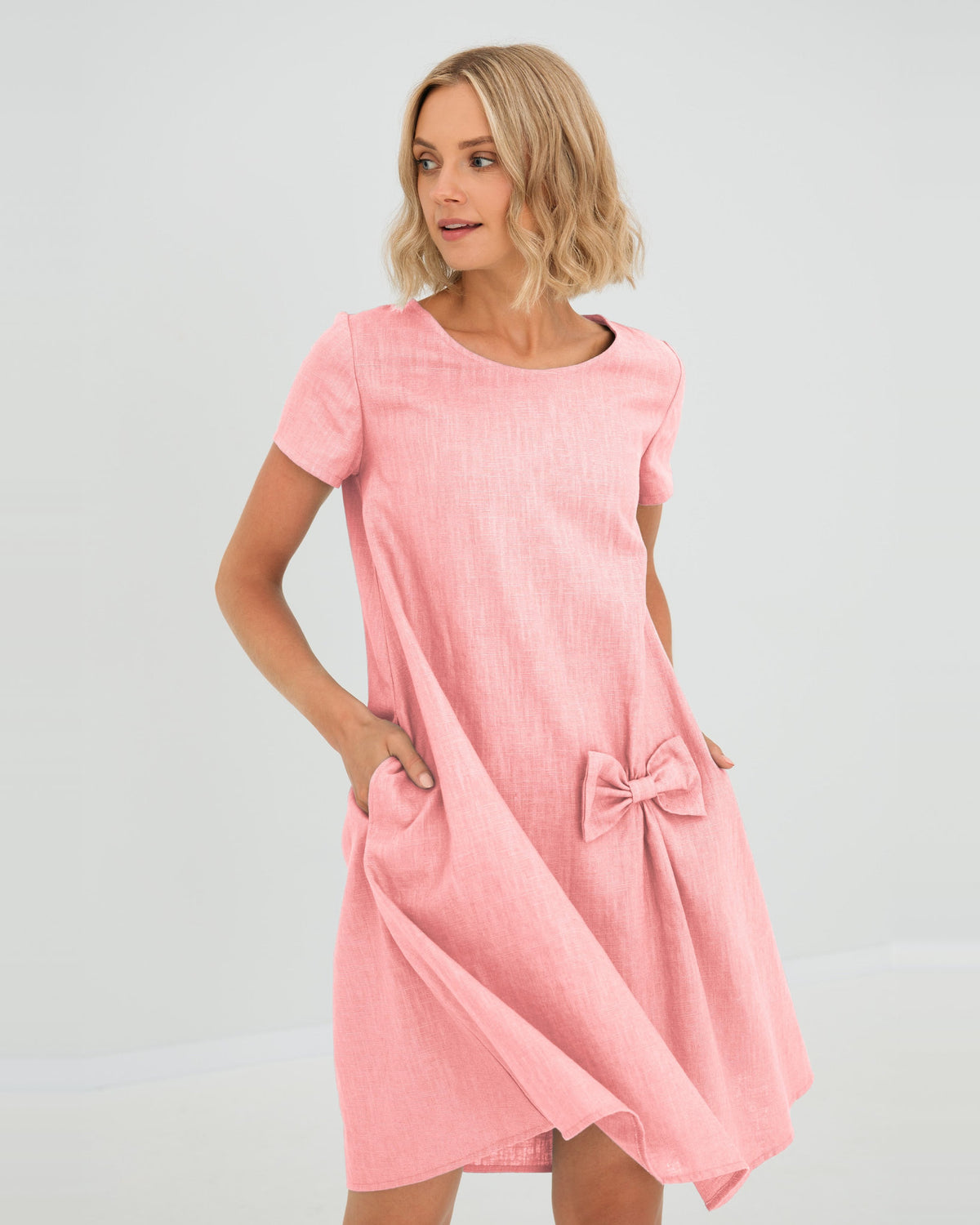 LeMuse SUMMER KISS linen dress in rose – studio front view, hand in pocket #Color_Rose