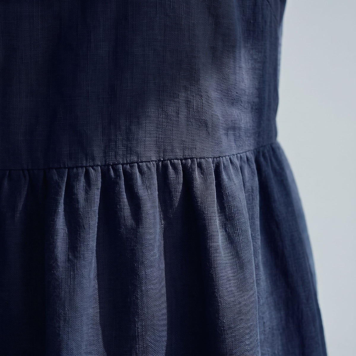 A navy linen dress.