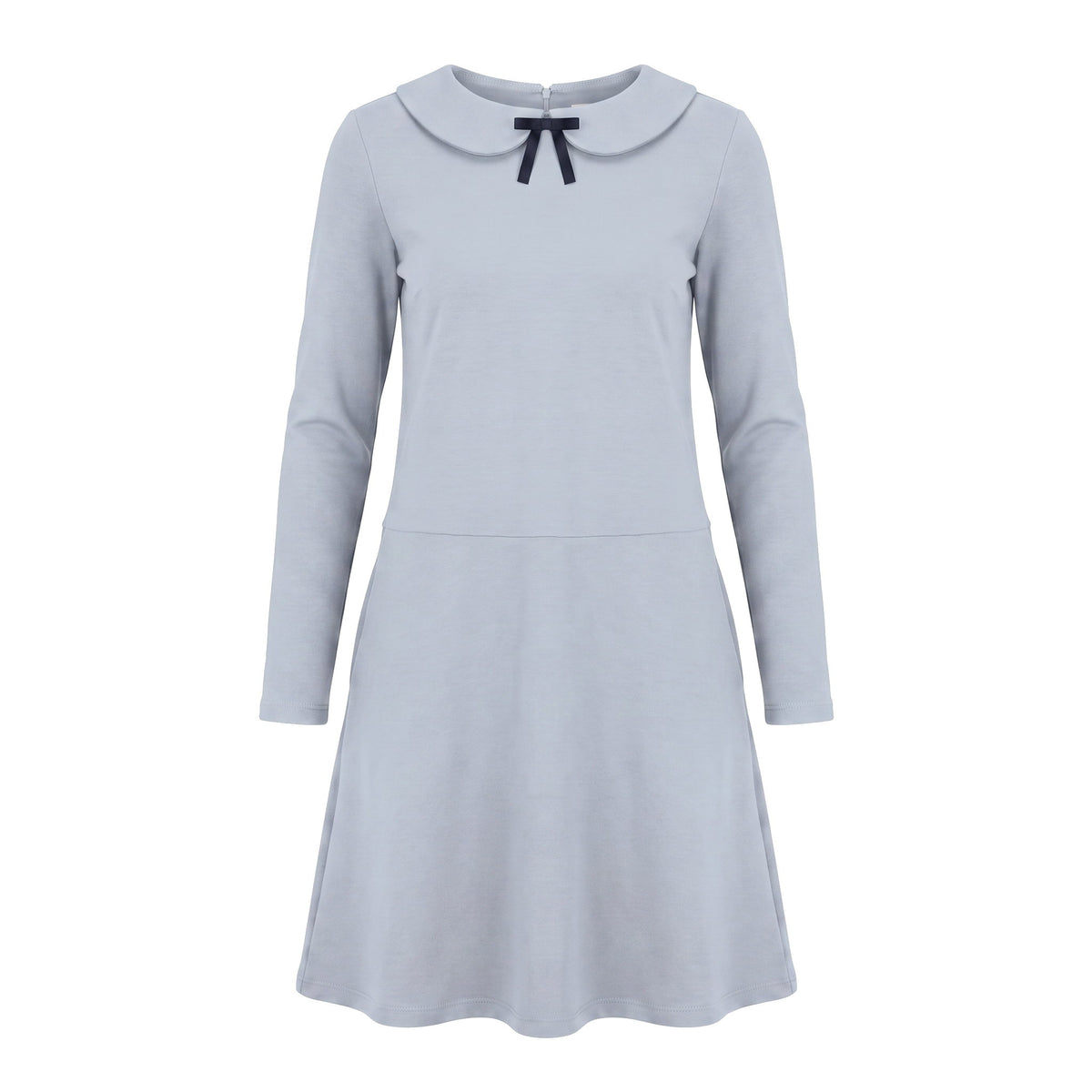 A long-sleeve A-line dress in a light blue color with a small dark navy bow at the neckline, shown against a plain white background.