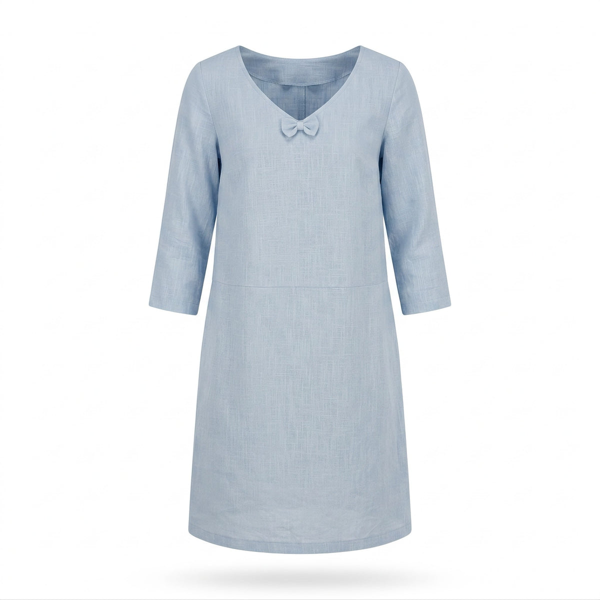 A light blue linen dress with three-quarter sleeves and a small bow detail at the neckline, shown against a plain white background.