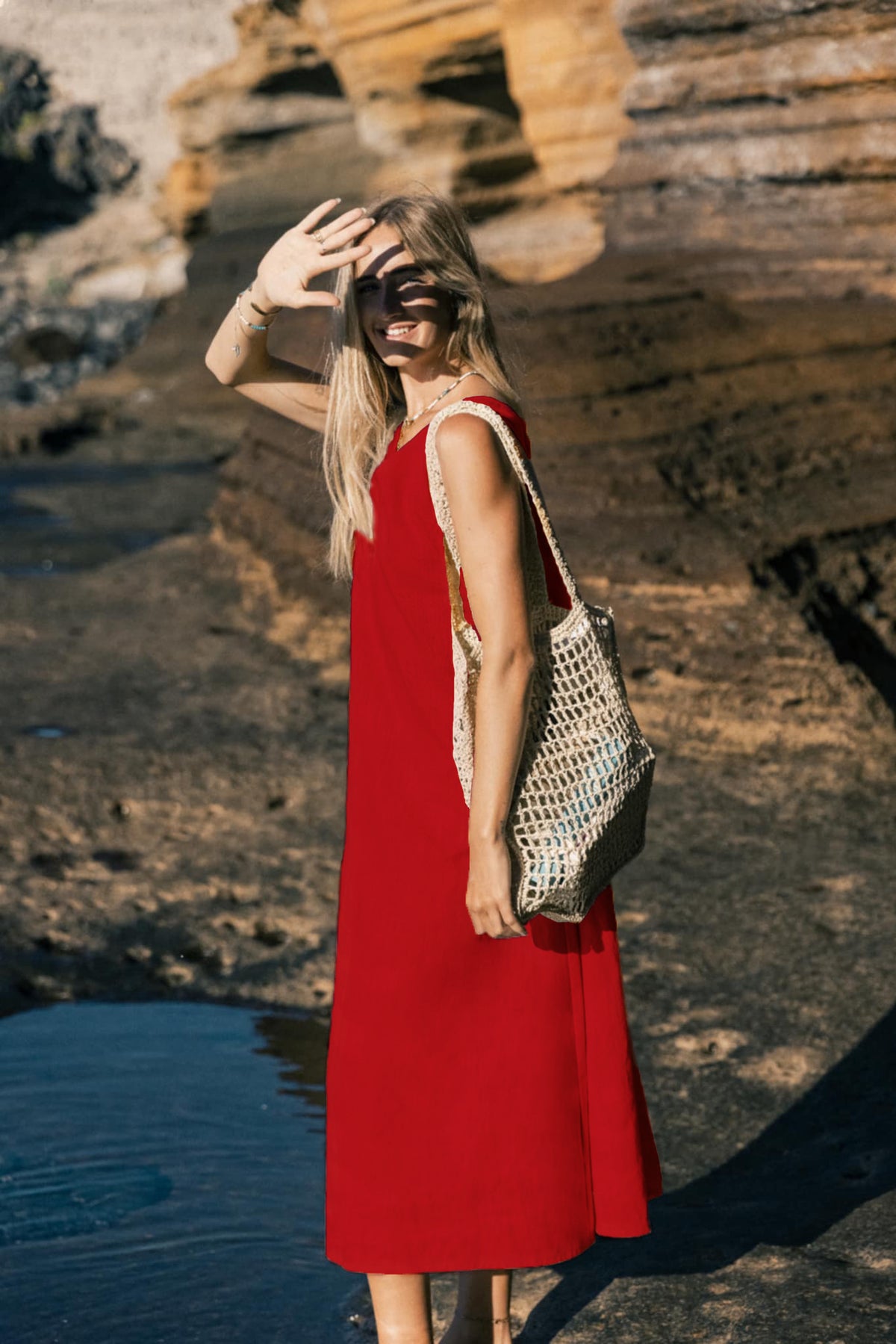 LeMuse SUNSET linen dress in red – model front full length by the cliffs #Color_Red