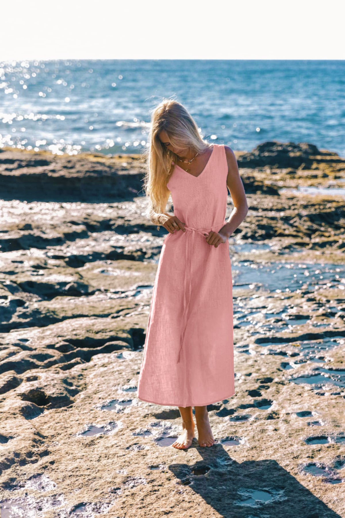 LeMuse SUNSET linen dress in rose – model front full length by the sea #Color_Rose